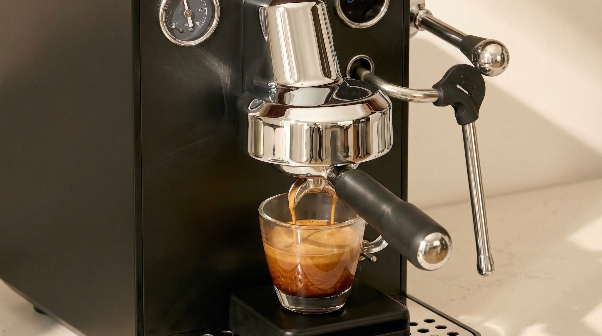 Gemilai G3006 Espresso machine brewing a shot of coffee into a glass.
