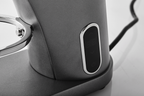 Gemilai G9010C coffee grinder side view with control button