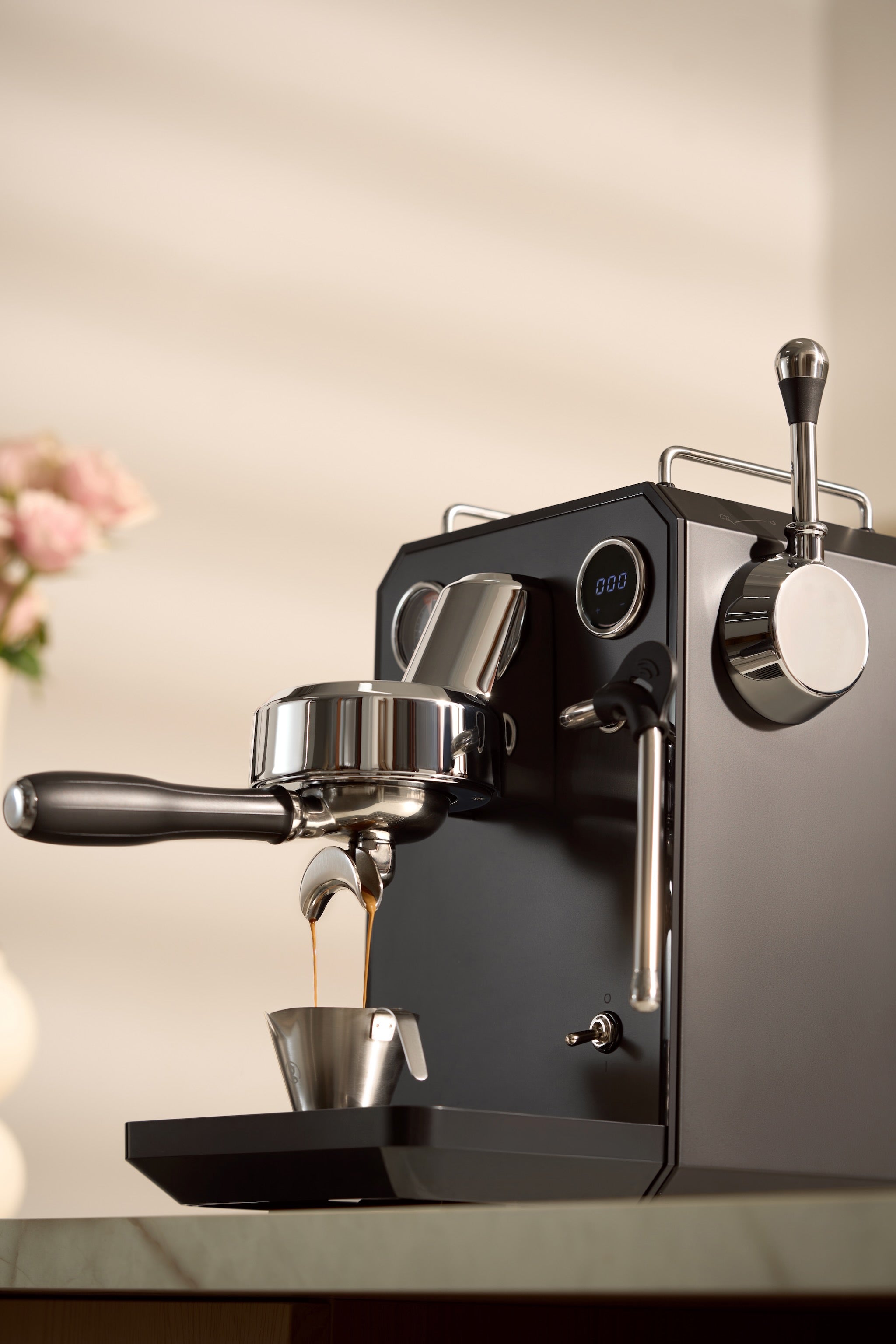 Home barista preparing espresso with Espressimo equipment